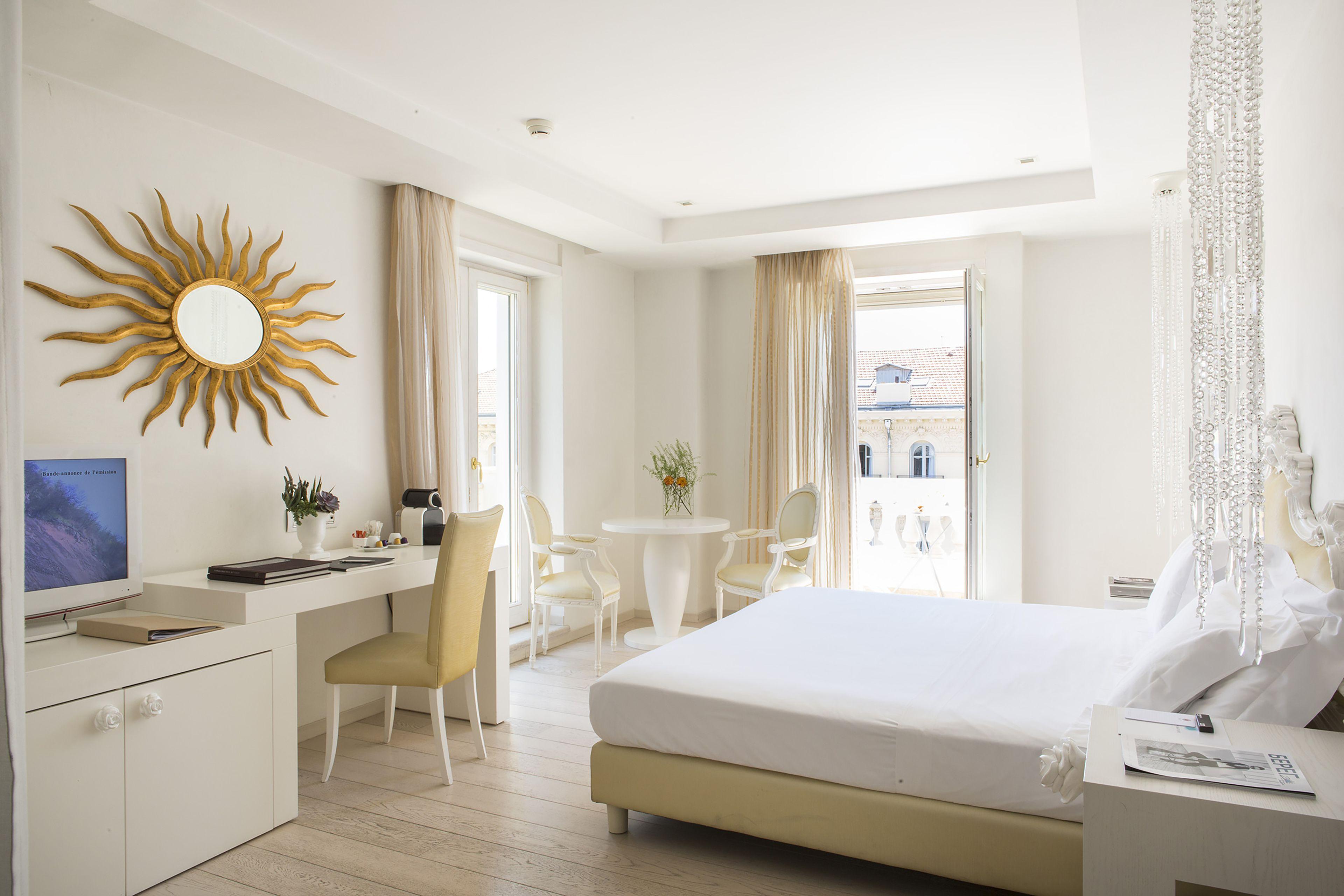 Bright empty hotel room in Nice with elegant light interior
